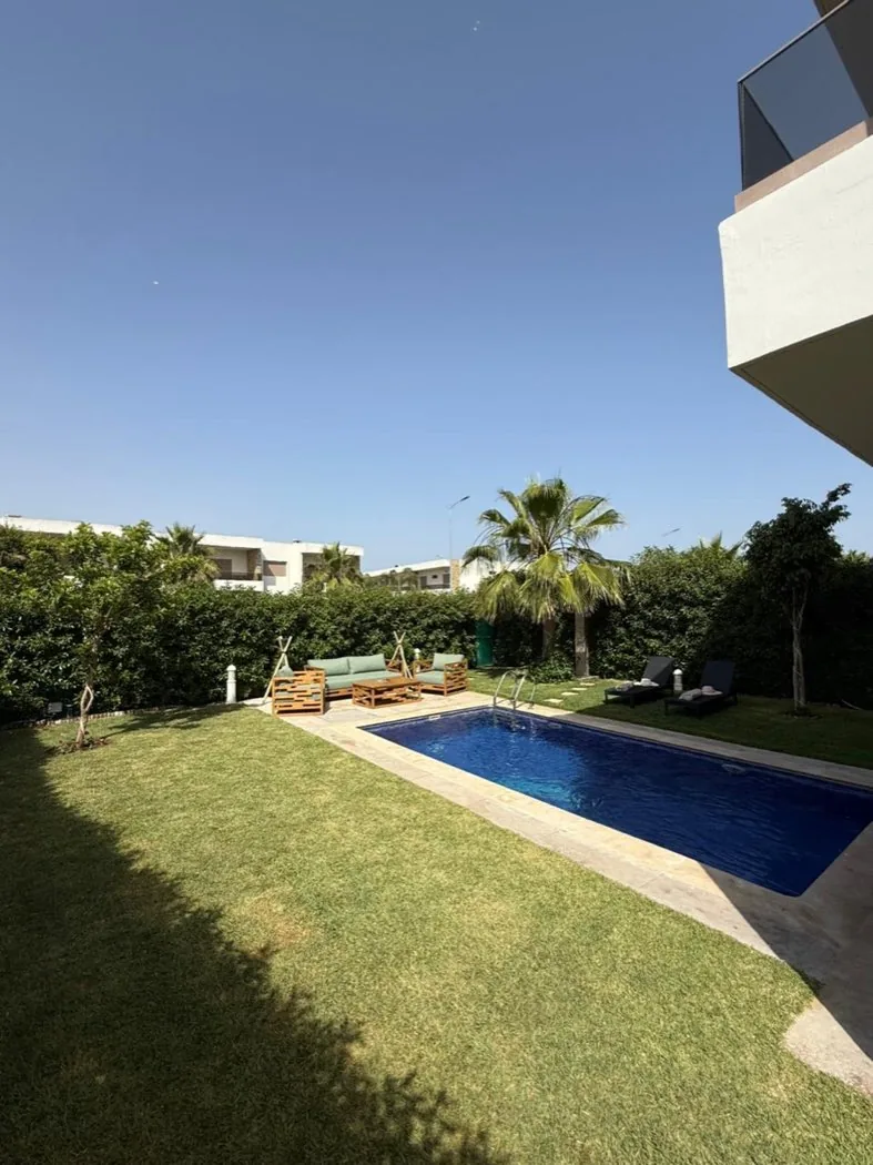 Piscine privée et jardin de Villa Silya à Sidi Rahal
